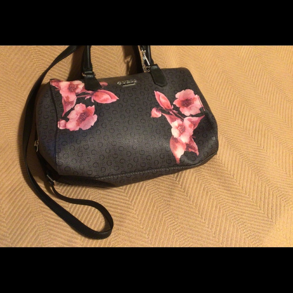 Guess Satchel. NWOT. Black with pink flowers.